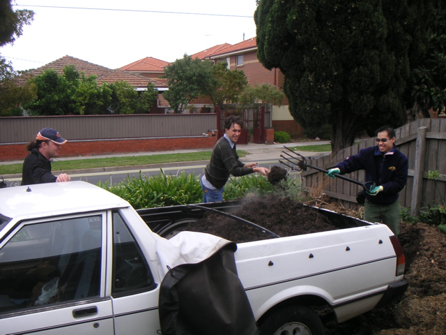 Loading up with still-warm compost