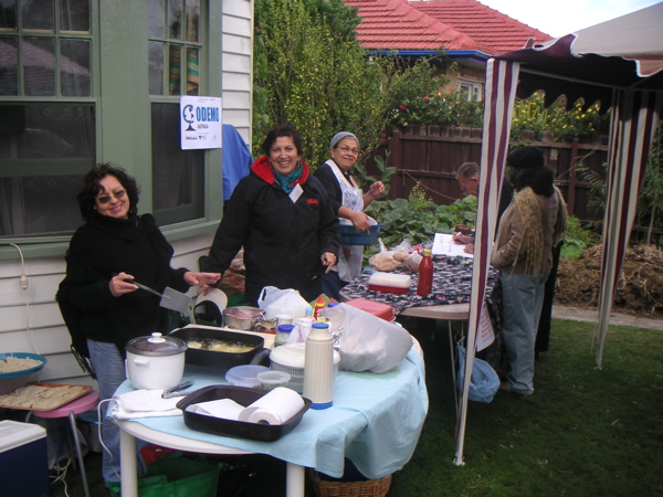 Maria, Marta, and Vilma setting up.JPG